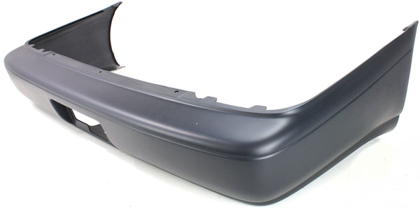 1993-1997 Toyota Corolla Rear Bumper Cover, Primed, Sedan for the years: 1993, 1994, 1995, 1996, 1997